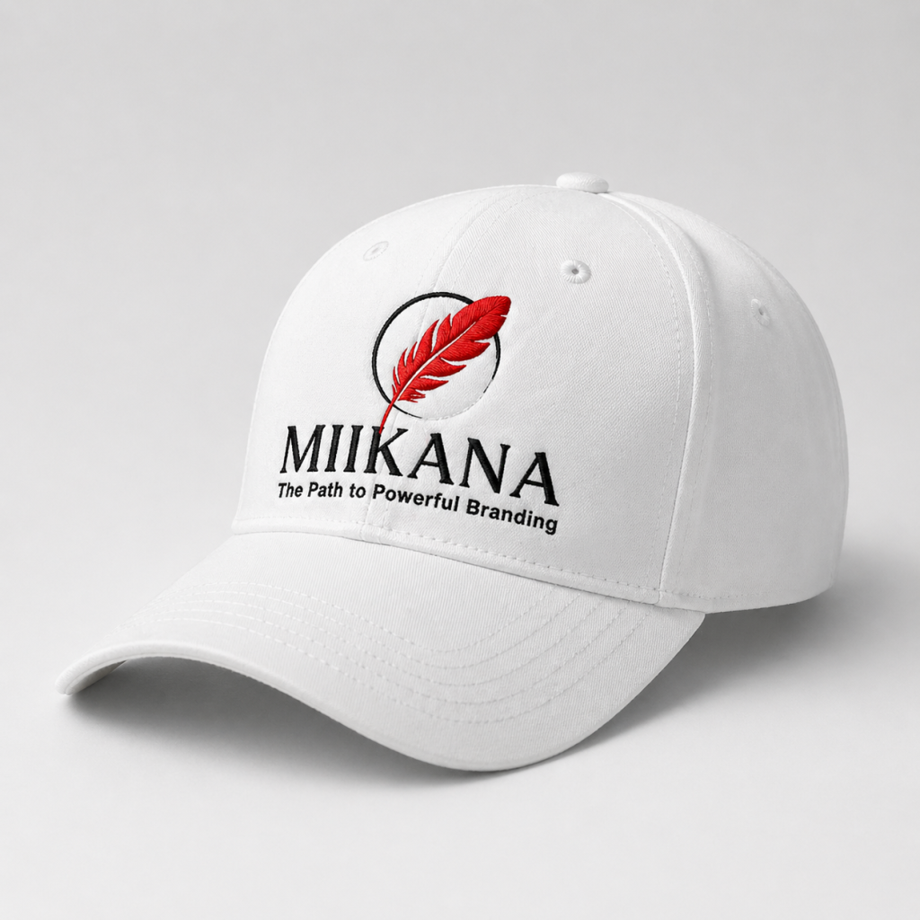 White embroidered cap with Miikana logo and red feather design